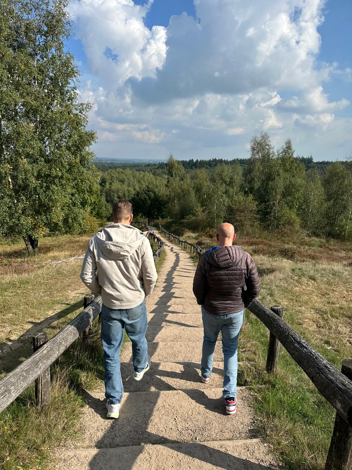 Johan de Wit in conversation with a founder while walking outdoors