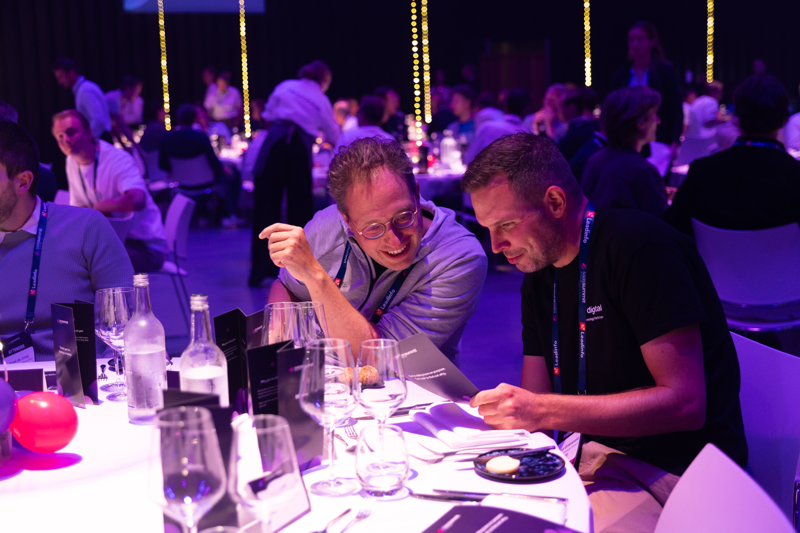 Software founders in conversation at a We Love SaaS gathering