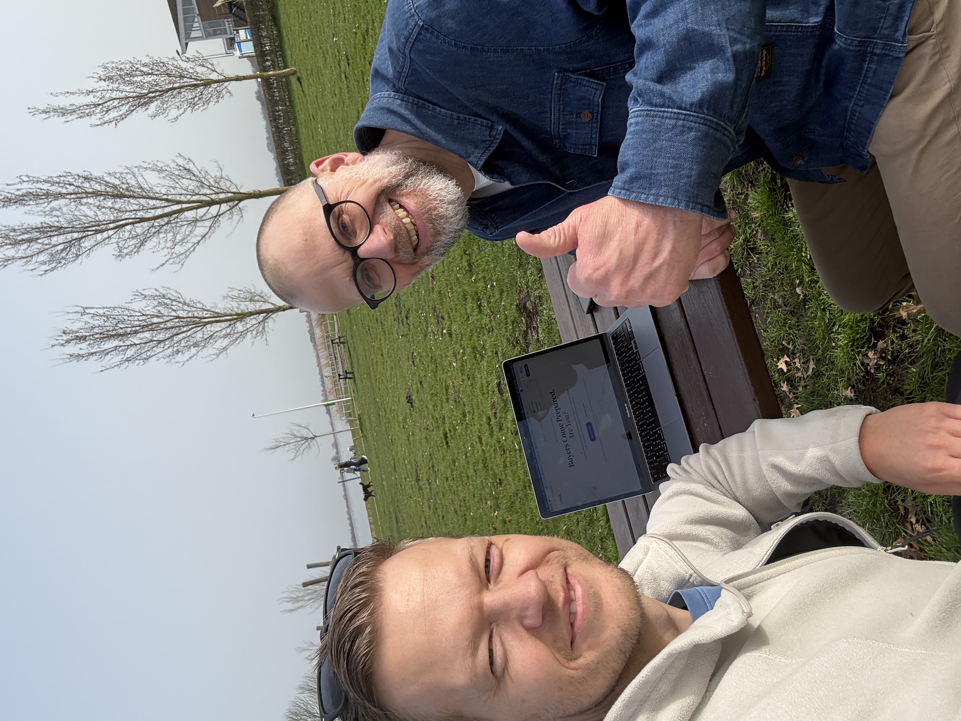Johan de Wit and a founder working at a table with a notebook